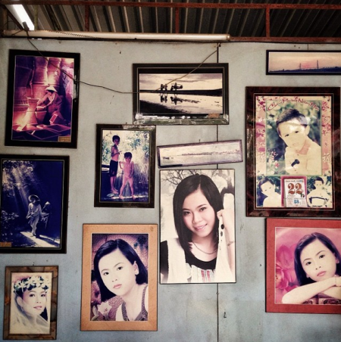 David Guttenfelder, "Prints hang in the wall at a photo studio in a Vietnamese village. When I'm traveling, new to a place and want to know what's going on, I like to go see the local photo lab owner and meet the photographers who hang around there.", 2014